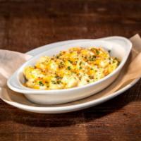 Comfort Mac-N-Cheese · Four-cheese sauce and toasted garlic breadcrumbs.