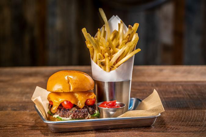 Bear'S Burger · Sharp cheddar, smoked tomatoes, caramelized onion, butter lettuce, rosemary aioli, brioche bun, and bear fries.