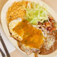 Huevos Rancheros O Divorciados · Two eggs with either one salsa or two on top.