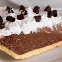Chocolate Cream Pie Slice · Creamy chocolate filling baked into a fresh pie with a buttery crust.