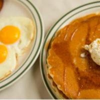 Breakfast Combinations · Choice of pancakes, thin waffle or French toast plus two thick slices of bacon or two sausag...