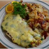 Fresh Spinach Omelet · Sautéed spinach, mushrooms, and onions, topped with melted jack cheese.