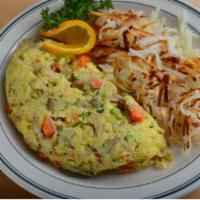 Veggie Omelet · Sautéed onions, mushrooms, carrots, and broccoli with our tomatillo salsa on the side.