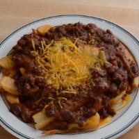 Chili Cheese Fries · Steak fries topped with our own chili and melted cheddar cheese.