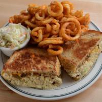 Tuna Melt · Albacore tuna salad with melted cheddar cheese on grilled sourdough bread.