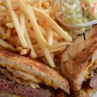 Patty Melt · 1/2 lb. burger patty with melted cheddar cheese, and grilled onions on grilled marble rye br...