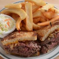 Roast Beef Melt · Thin slices of roast beef, grilled onions, and melted cheddar cheese on grilled sourdough br...