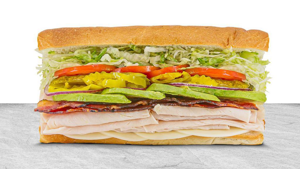 Turkey, Avocado & Bacon · Turkey breast, bacon slices, fresh sliced avocado, and Provolone cheese.  Comes with THE WORKS!