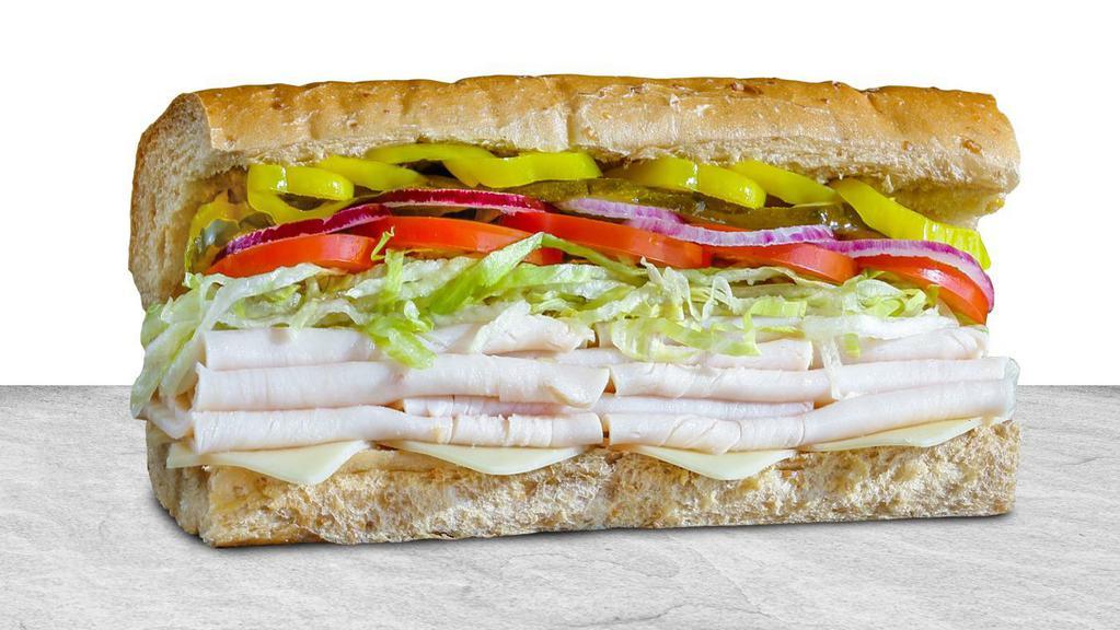 Classic Turkey · Turkey breast and aged Swiss cheese.  Comes with THE WORKS!