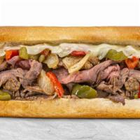 Philly Cheese Steak · Grilled tri-tip, grilled peppers and onion, and Jack cheese melted together.  Comes with THE...