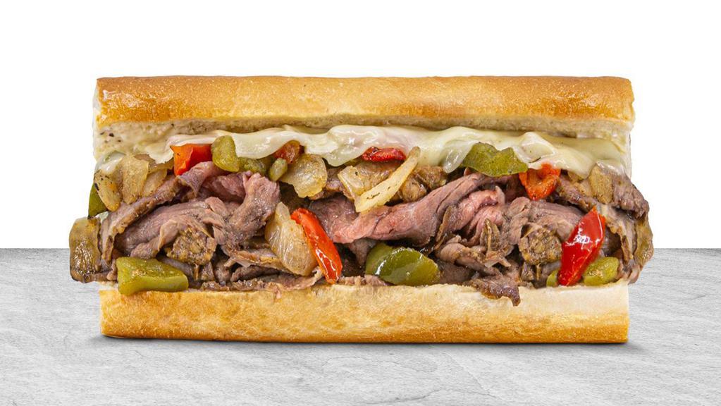 Philly Cheese Steak · Grilled tri-tip, grilled peppers and onion, and Jack cheese melted together.  Comes with THE WORKS!