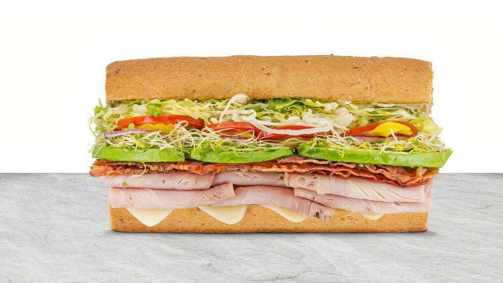 Ham, Bacon, Avocado & Sprouts · Premium smoked ham, bacon slices, sprouts, fresh sliced avocado, and aged Swiss cheese.  Comes with THE WORKS!