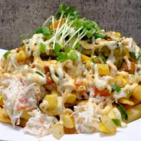 Kamikaze Fries · Signature crab mix, avocado, and mango salsa on a bed of fries. Topped with spicy mayo, eel ...