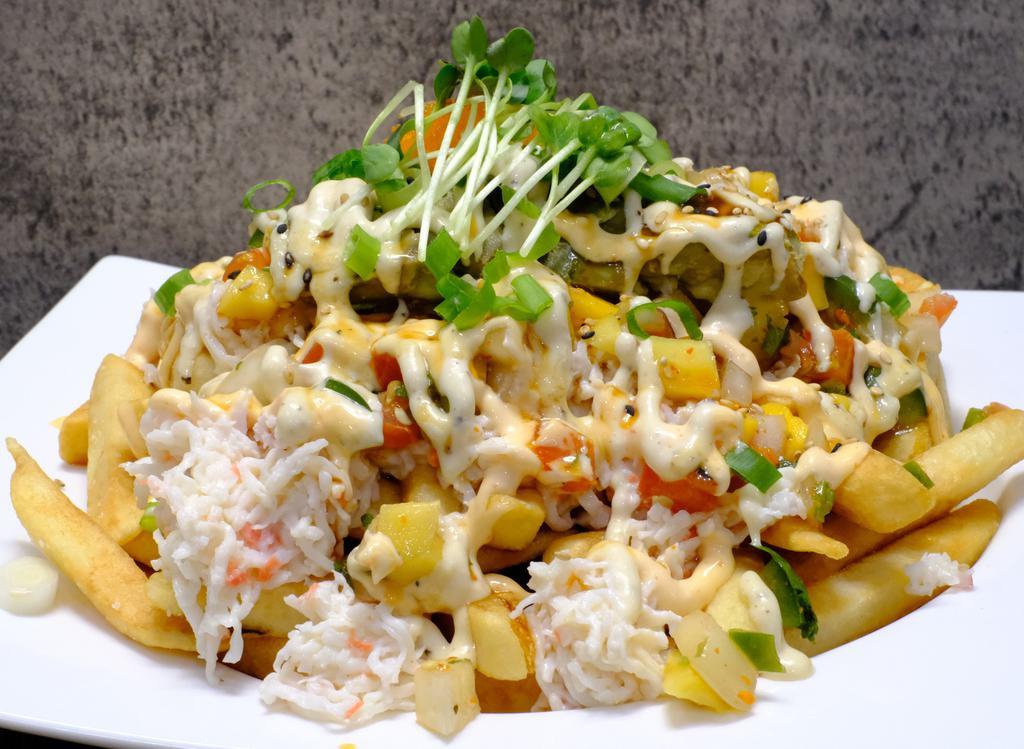 Kamikaze Fries · Signature crab mix, avocado, and mango salsa on a bed of fries. Topped with spicy mayo, eel sauce, and garlic aioli.