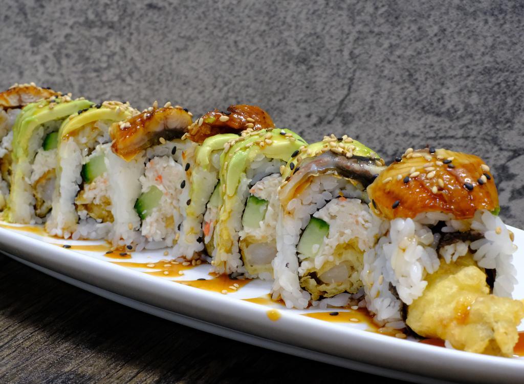 Dragon Roll · Shrimp tempura, crab mix, and cucumber topped with unagi, avocado, and eel sauce.