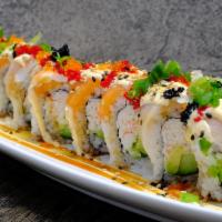 Geisha Roll · Crab mix, avocado, cucumber, topped with chef's choice assorted fish, tobiko, masago, chives...
