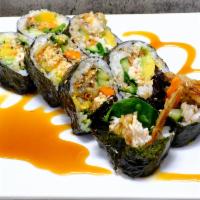 Spider Roll · Crab mix, lettuce, cucumber, avocado, soft shell crab, pickled carrots topped with eel sauce.