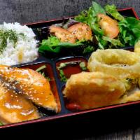 Salmon Teriyaki · Salmon teriyaki with vegetable tempura, house salad, steamed rice, and miso soup.