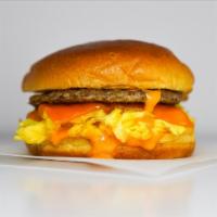 Sausage, Egg And Cheddar Brioche Sandwich · 2 fresh cracked cage-free scrambled eggs, melted Cheddar cheese, breakfast sausage, and Srir...