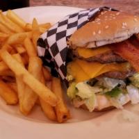 Western Bacon Burger · A deluxe burger with our secret recipe BBQ sauce, melted cheddar, and grilled onion. Served ...