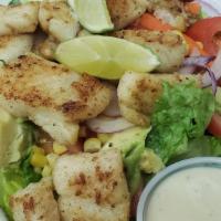 Fish Salad · Lettuce, tomato, onions, corn, avocado, and carrots.
