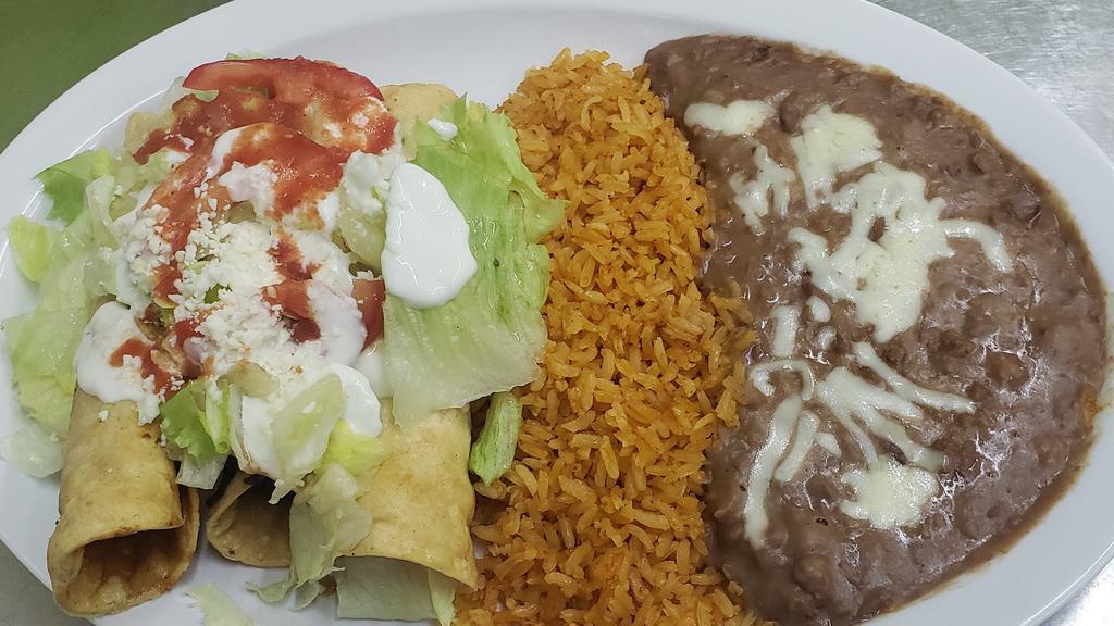 3 Flautas · Served with rice and beans.