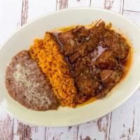 Shredded Beef (Birria) · Served with rice and beans. Also comes with flour or corn tortillas.