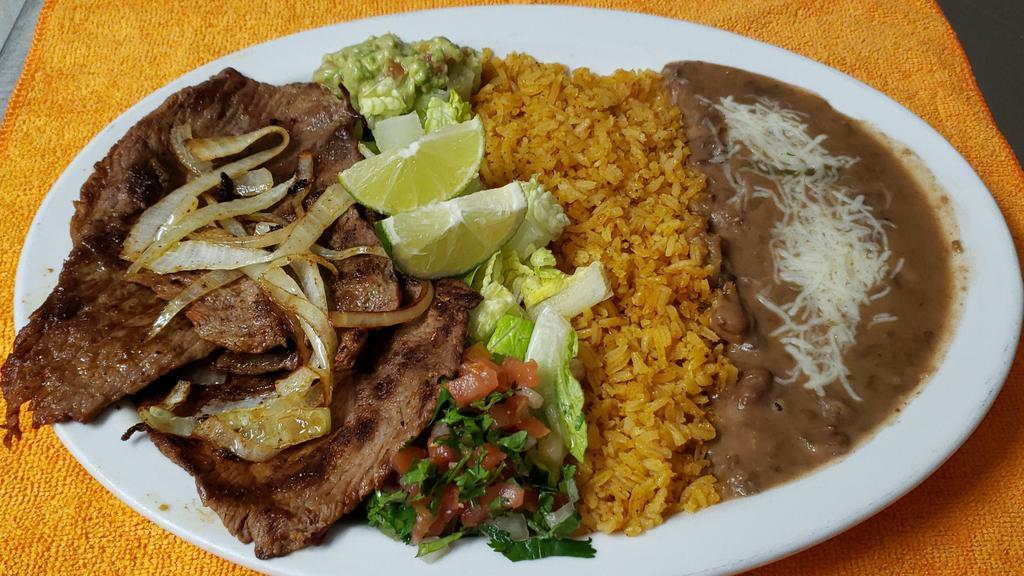 Steak (Carne Asada) Plate · Served with rice and beans. Also comes with flour or corn tortillas.