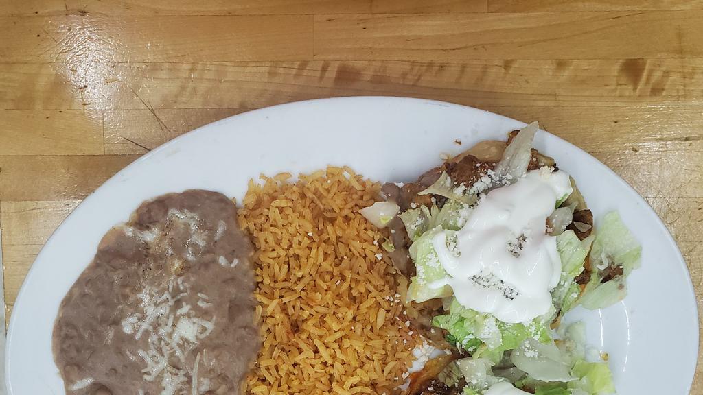 2 Sopes Plate · Served with rice and beans.