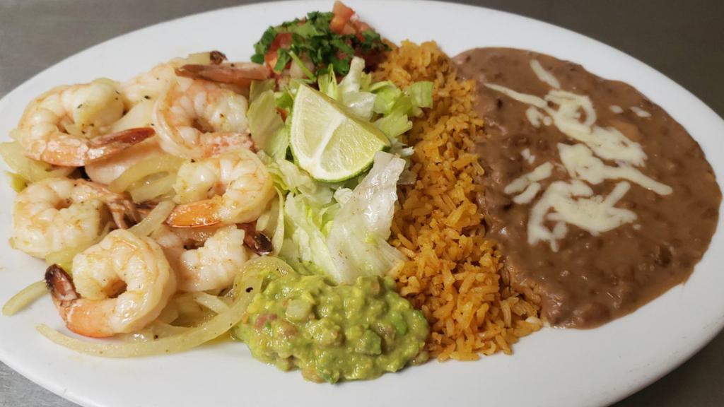 Shrimp Al Mojo De Ajo · Served with rice and beans. Also comes with flour or corn tortillas.