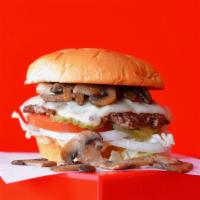 Super Smash Mushroom Swiss Cheeseburger · Juicy grilled beef burger smashed to perfection on a toasted potato bun with swiss cheese, g...