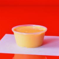 Side Of Melted Cheese Sauce · 