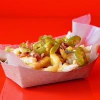 Jalapeno Bacon Cheese Fries · Crinkle cut fries topped with melted cheese sauce, smoked bacon and jalapenos