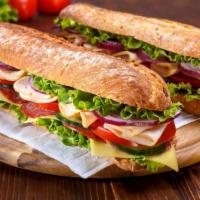 Turkey, Salami & Cheese Sub · For those who love meat, this classic sub has salami, turkey, and cheese, served with lettuc...