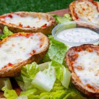 Potato Skins · skimmed potatoes filled with red sauce and cheese