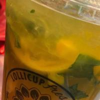 Mango Breeze · a. Mango green tea, lemon, basil and mango bits.