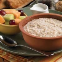 Great Start Breakfast · Oatmeal with raisins and brown sugar, fresh fruit, choice of pancakes or toast, and coffee.