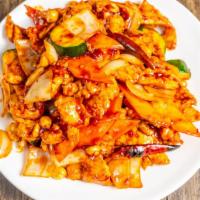 Kung Pao Chicken · Spicy. Sliced white meat chicken with peanuts, onions, dry chili peppers, and zucchini in tr...