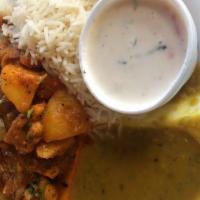 Vindaloo · Fiery hot, tangy curry cooked with onions and potatoes Choice of Chicken, Lamb, Shrimp.