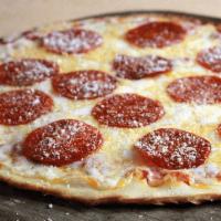 Classic Pepperoni Pizza · organic tomato sauce, mozzarella, pepperoni