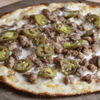 Meat & Peppers Pizza · olive oil, mozzarella, italian sausage, beef meatballs, jalapeños