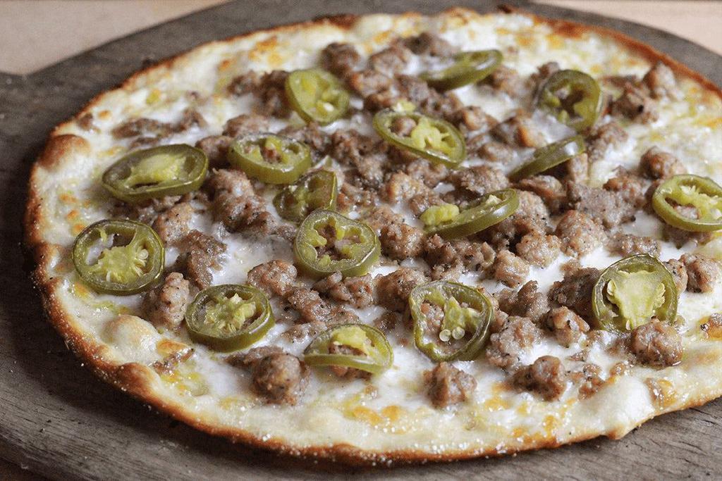 Meat & Peppers Pizza · olive oil, mozzarella, italian sausage, beef meatballs, jalapeños