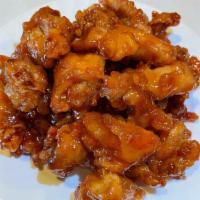Orange Spicy Chicken · Hot & Spicy. Light batter fried chicken chunk toss cooked with orange peel sauce mild spicy.