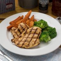 Herb Grilled Chicken Breast · Chicken breasts topped with herb butter. Served over mashed potatoes and seasonal vegetables...