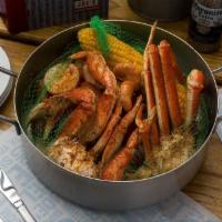 Joe'S Steampot · Dungeness crab, sweet snow crab, shrimp and smoked sausage, Old bay. This item can be prepar...
