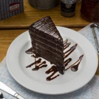 Chocolate Shack Attack · Six hearty layers of dark chocolate cake separated by rich chocolate ganache.