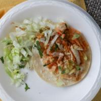 Fish Taco · Grilled fish with onions, cilantro, lettuce and salsa.
