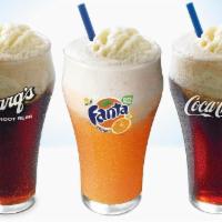 Floats · Made with hand-scooped, real ice cream and Rootbeer, Coke or Fanta Orange.