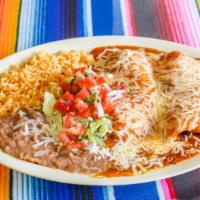 #7 Cheese Enchiladas (2)Entree · Two handmade enchiladas with cheese or your choice of chicken or beef topped with scratch ma...