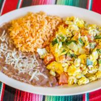 Huevos Mexicanos · Eggs scrambled with fresh tomatoes, onions, and jalapenos. Served with rice, beans, and corn...